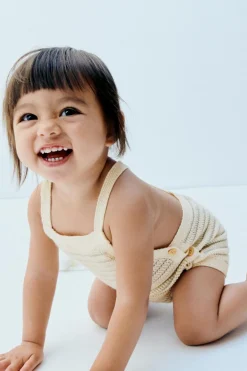 BABYGROW DE MALHA ÀS RISCAS COM BOTÕES-ZARA Outlet