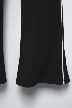 CALÇAS À BOCA DE SINO COM MODAL E FAIXA LATERAL-ZARA New