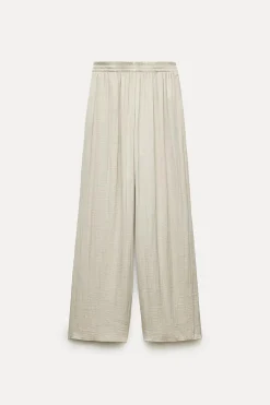 ZARA Calças^CALÇAS ACETINADAS COM CINTURA ELÁSTICA Cava