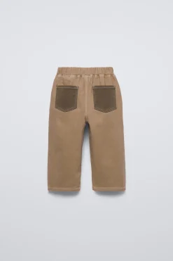 CALÇAS BOLSOS CONTRASTE-ZARA Hot