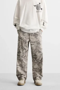 ZARA Calças^CALÇAS CARPINTERO COM ESTAMPADO Cinzento