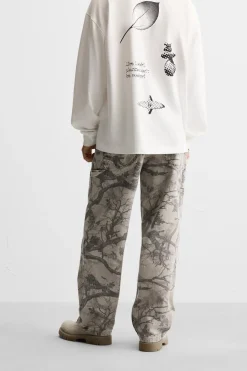 ZARA Calças^CALÇAS CARPINTERO COM ESTAMPADO Cinzento