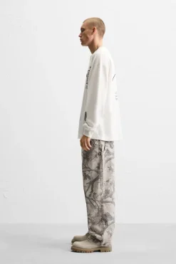 ZARA Calças^CALÇAS CARPINTERO COM ESTAMPADO Cinzento