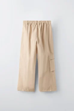 CALÇAS COM BOLSO E ZIP-ZARA Shop