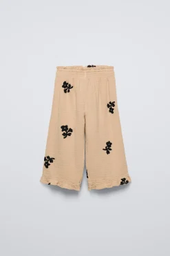 CALÇAS COM ESTAMPADO DE FLORES-ZARA Outlet