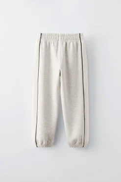 CALÇAS COM FAIXAS E DEBRUADOS EM CONTRASTE-ZARA Cheap