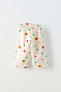 CALÇAS COM FLORES BORDADAS-ZARA New