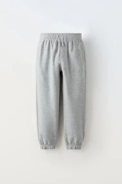 CALÇAS COM MENSAGEM BORDADA-ZARA Clearance