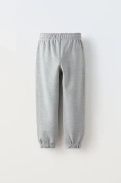 CALÇAS COM MENSAGEM BORDADA-ZARA Clearance