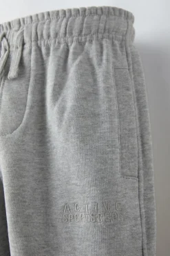 CALÇAS COM MENSAGEM BORDADA-ZARA Clearance