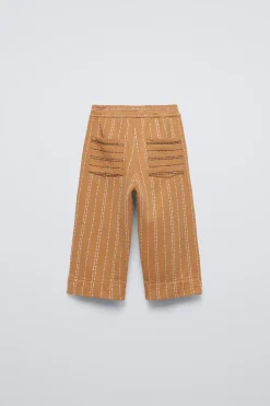 CALÇAS COM PESPONTOS-ZARA Store