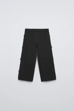 CALÇAS COM TEXTURA E LAÇOS-ZARA Store