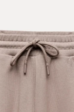 ZARA Calças|Sweatshirts / Joggers^CALÇAS DE FELPA COM ETIQUETA Avermelhado
