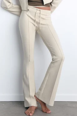 ZARA Winter Layersnew|Calças^CALÇAS FLARE INTERLOCK COSTURAS Cru