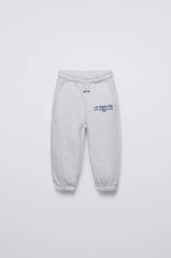 CALÇAS JOGGER COM BORDADO-ZARA Shop