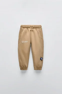 CALÇAS JOGGER COM MENSAGEM EM RELEVO-ZARA Store