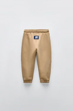 CALÇAS JOGGER COM MENSAGEM EM RELEVO-ZARA Store