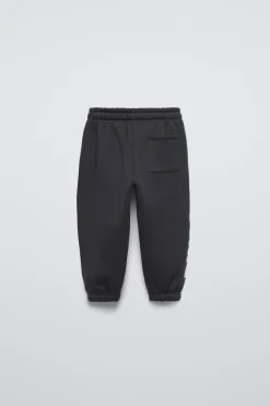CALÇAS JOGGER DINOSSAURO-ZARA Online