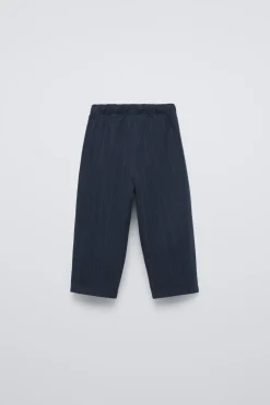 CALÇAS ÀS RISCAS-ZARA Outlet