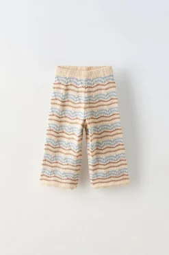 CALÇAS ÀS RISCAS COM BRILHO-ZARA New