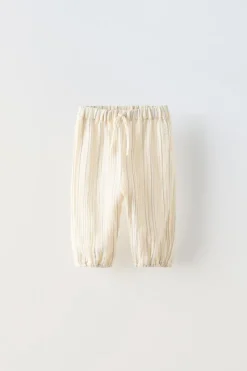 CALÇAS ÀS RISCAS EM CREPE-ZARA Discount