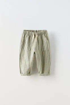 CALÇAS ÀS RISCAS RÚSTICAS-ZARA Store