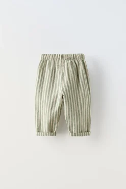 CALÇAS ÀS RISCAS RÚSTICAS-ZARA Store