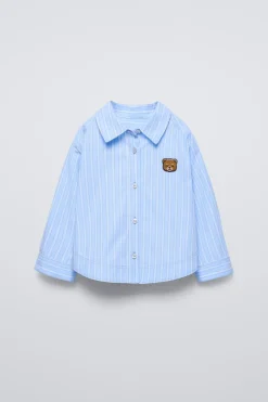 CAMISA ÀS RISCAS COM REMENDO DE URSO-ZARA Best
