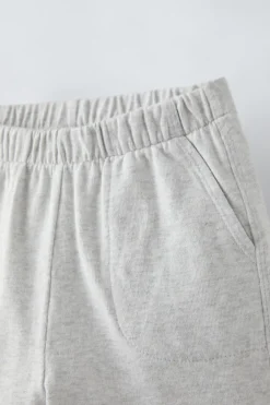 CONJUNTO DE T-SHIRT COM BOLSO E CALÇÕES BERMUDA-ZARA Shop