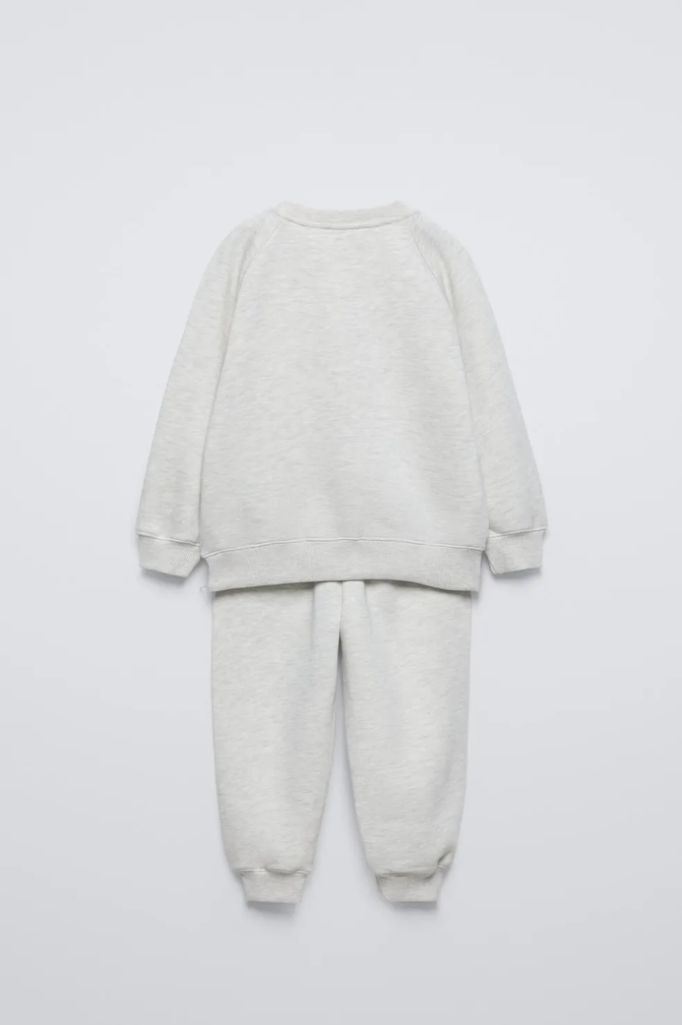 CONJUNTO JOGGING DE SWEATSHIRT E CALÇAS COM MENSAGEM FLOCKED-ZARA Online