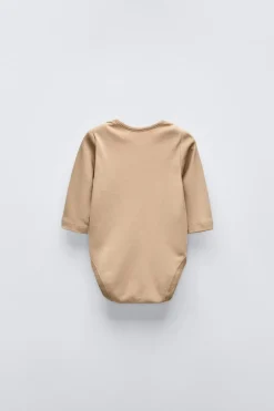 PACK DE CINCO BODIES COM DIENTES DE LEÃO-ZARA Hot