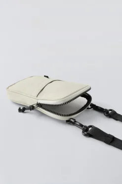 PORTA-TELEMÓVEL COM EFEITO DE CAUCHO-ZARA Sale